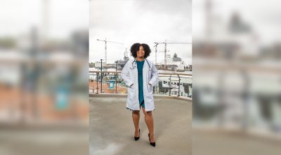 Veterinary student in a white coat.