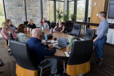 Group of professionals in a conference room.